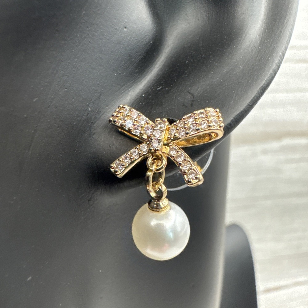 Gold Tone Faux Pearl Bow Earrings Made with Swarovski® crystals